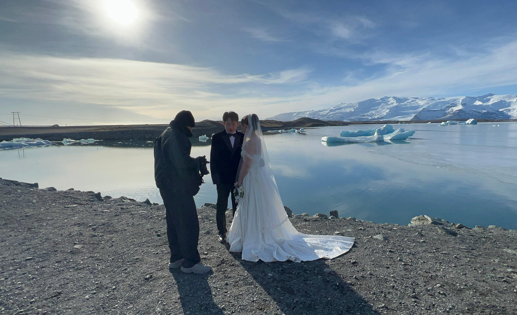 Bride and groom on Iceland beach